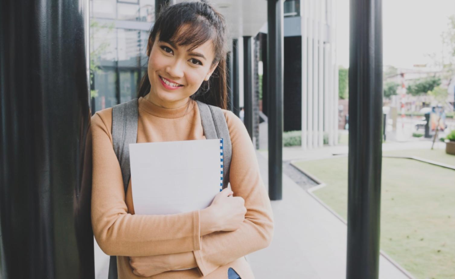 Modern workspace with financial planning tools, calculator, and investment research materials