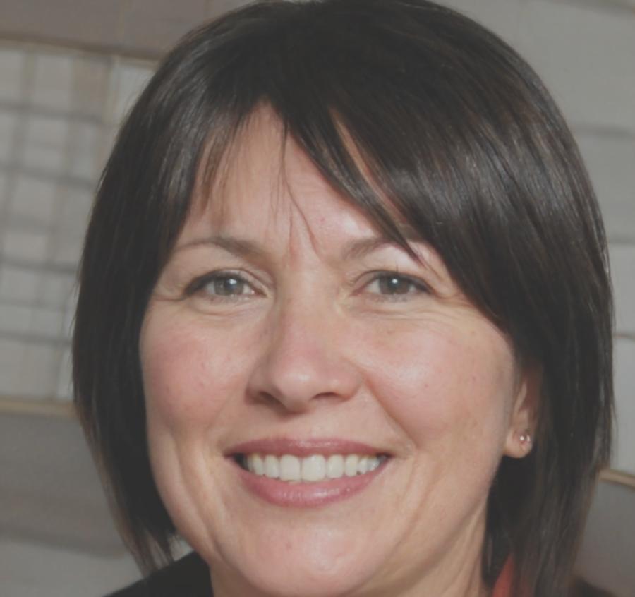 Professional headshot of financial expert